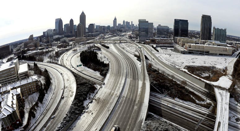 The ice-covered interstate system shows the remnants of a 2014 winter snow storm in Atlanta. The ice-covered interstate system shows the remnants of a 2014 winter snow storm in Atlanta.