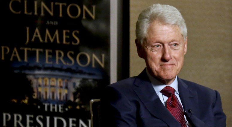 In this Monday, May 21, 2018, photo, former President Bill Clinton listens during an interview about a novel he wrote with James Patterson, "The President is Missing," in New York. former President Bill Clinton