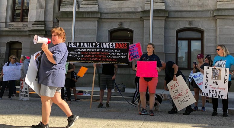 Activists gathered outside Philadelphia City Hall Wednesday night to demand more funding for the city's animal intake center, Animal Care and Control Team. Activists gathered outside Philadelphia City Hall Wednesday night to demand more funding for the city's animal intake center, Animal Care and Control Team.
