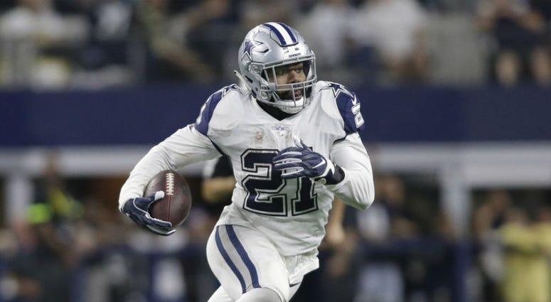 Dallas Cowboys running back Ezekiel Elliott (21) runs the ball in the fourth quarter against the New Orleans Saints at AT&T Stadium. Dallas Cowboys running back Ezekiel Elliott (21) runs the ball in the fourth quarter against the New Orleans Saints at AT&T Stadium.
