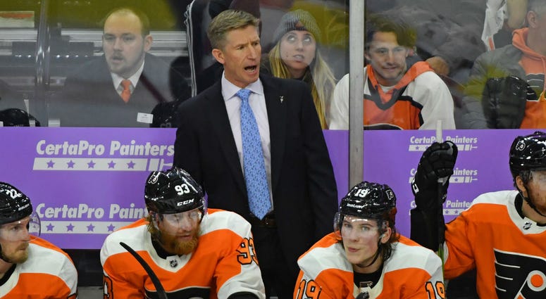 Philadelphia Flyers head coach Dave Hakstol behind the bench against the Ottawa Senators during the third period at Wells Fargo Center. Philadelphia Flyers head coach Dave Hakstol behind the bench against the Ottawa Senators during the third period at Wells Fargo Center.