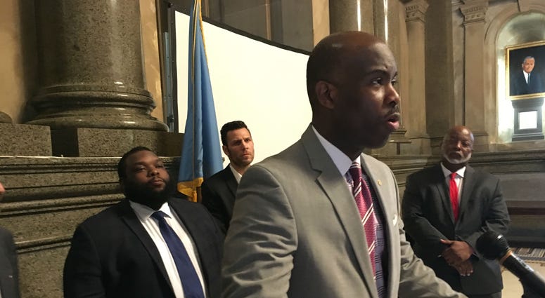 Philadelphia City Councilman Derek Green speaks as Pa. state Rep. Jordan Harris (far right) looks on. Philadelphia City Councilman Derek Green and Pa. state Rep. Jordan Harris
