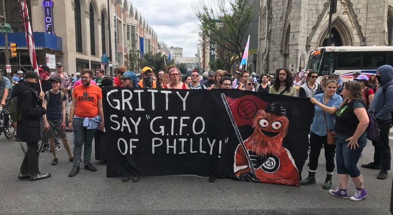 Protesters rally outside the Pennsylvania Convention Center ahead of President Donald Trump's speech at the National Electrical Contractors Association. Protesters rally outside the Pennsylvania Convention Center ahead of President Donald Trump's speech at the National Electrical Contractors Association.
