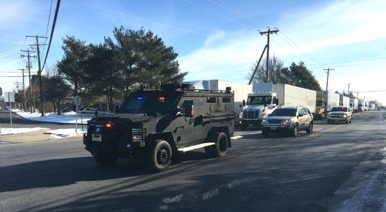 A SWAT vehicle arrives on the scene of a UPS facility in Logan Township following reports of an active shooter. A SWAT vehicle arrives on the scene of a UPS facility in Logan Township following reports of an active shooter.