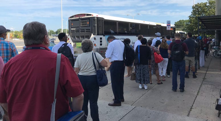 The shuttle in Lindenwold, N.J., did not have enough seats for all the people waiting. The shuttle in Lindenwold, N.J., did not have enough seats for all the people waiting.