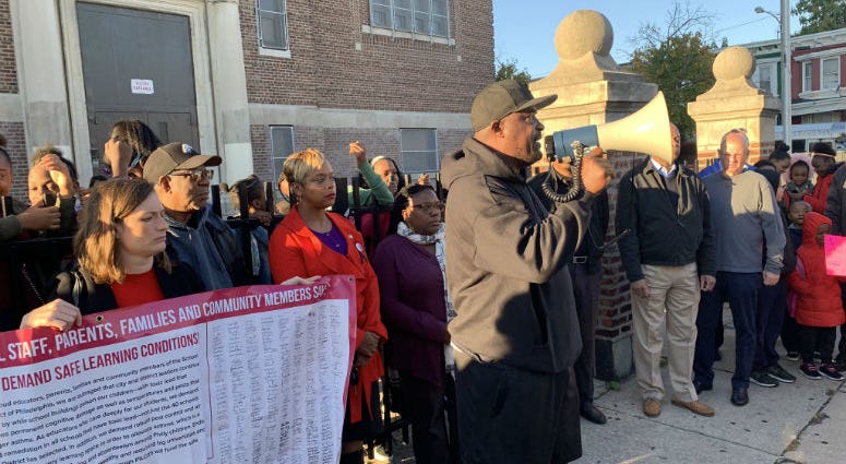 Activist Antoine Little leads a rally this morning outside T.M. Pierce Elementary School. Activist Antoine Little leads a rally this morning outside T.M. Pierce Elementary School.