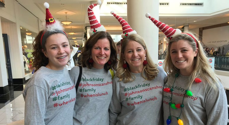 Black Friday shoppers wear matching outfits at the King of Prussia Mall. KOP Black Friday shoppers