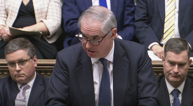 In this grab taken from video, Britain's Attorney General Geoffrey Cox gives his legal opinion during the Brexit debate in the House of Commons, in London, Tuesday March 12, 2019. In this grab taken from video, Britain's Attorney General Geoffrey Cox gives his legal opinion during the Brexit debate in the House of Commons, in London, Tuesday March 12, 2019.