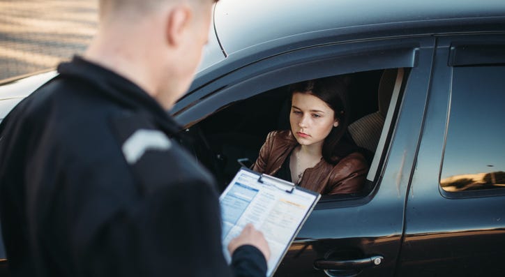 Police talking to driver. Police talking to driver.