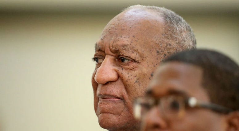 NORRISTOWN, PA - SEPTEMBER 24: Actor and comedian Bill Cosby returns to the courtroom after a lunch break with his spokesman Andrew Wyatt at the Montgomery County Courthouse.