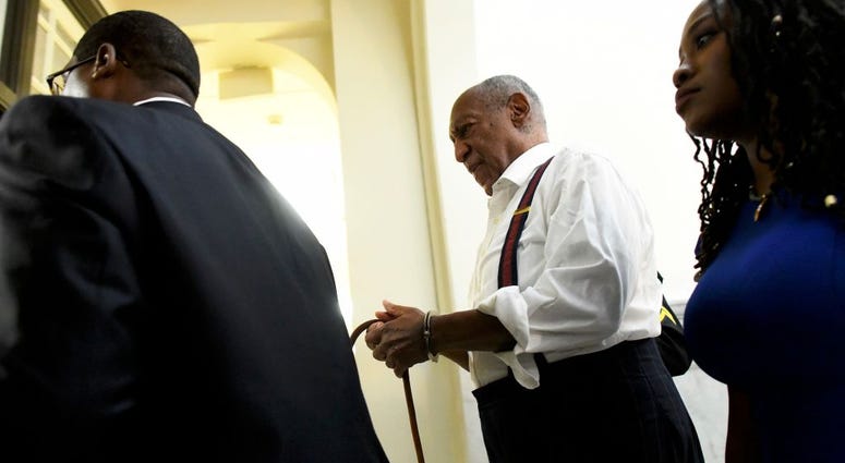 Bill Cosby is taken away in handcuffs after being sentenced to 3-10 years in his sexual assault retrial at the Montgomery County Courthouse on Sept. 25, 2018 in Norristown, Pennsylvania. Bill Cosby is taken away in handcuffs after being sentenced to 3-10 years.