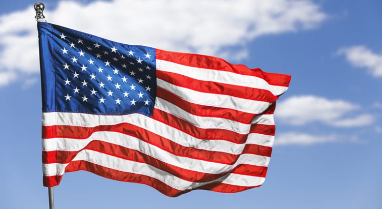 American Flag flies American Flag