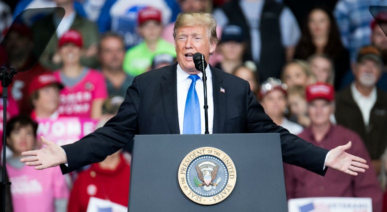 President Donald Trump addresses the crowd during a campaign rally at the Bojangles Coliseum on October 26, 2018 in Charlotte, North Carolina. President Donald Trump