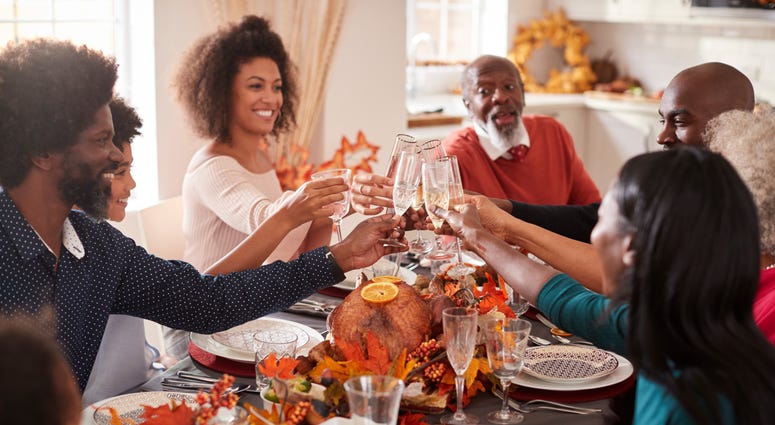 Family enjoys Thanksgiving dinner Family enjoys Thanksgiving dinner