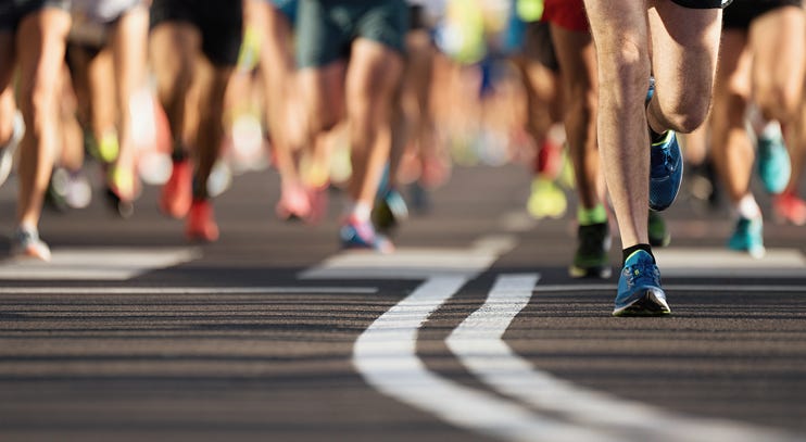 People running a race. People running a race.