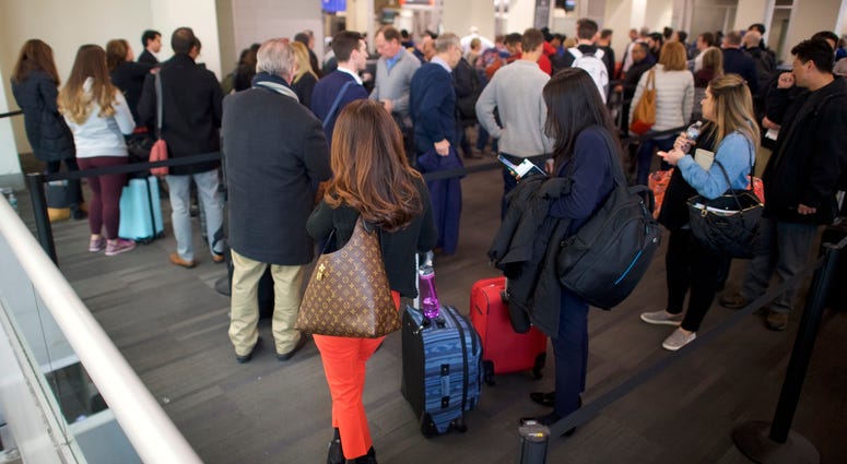 Travelers wait in long lines after Philadelphia Airport TSA and airport workers held a protest rally outside the Philadelphia International Airport on Jan. 25, 2019 in Philadelphia, Pennsylvania. Philadelphia International Airport