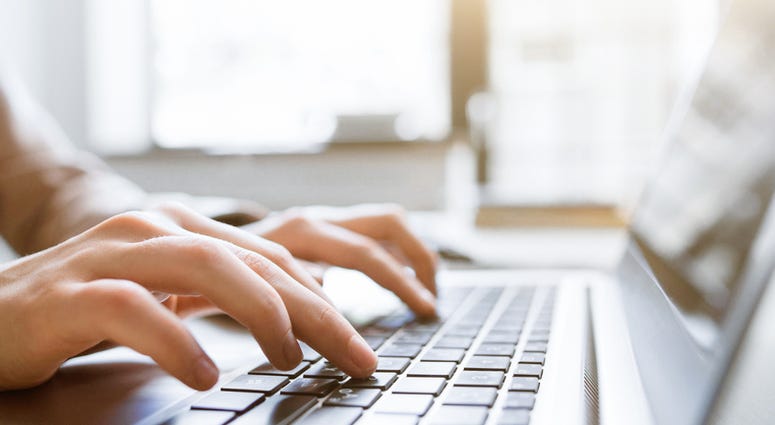 Typing on computer Typing on computer