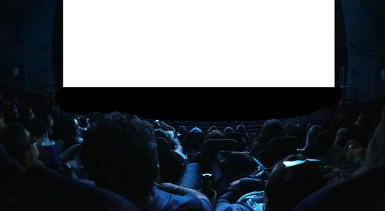 People watching a movie. People watching a movie.