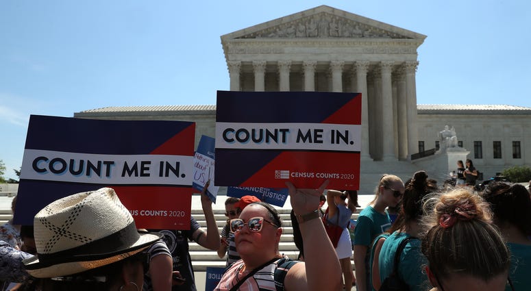 People gather in in front of the U.S. Supreme Court as decisions are handed down on June 27, 2019 in Washington, D.C. U.S. Supreme Court