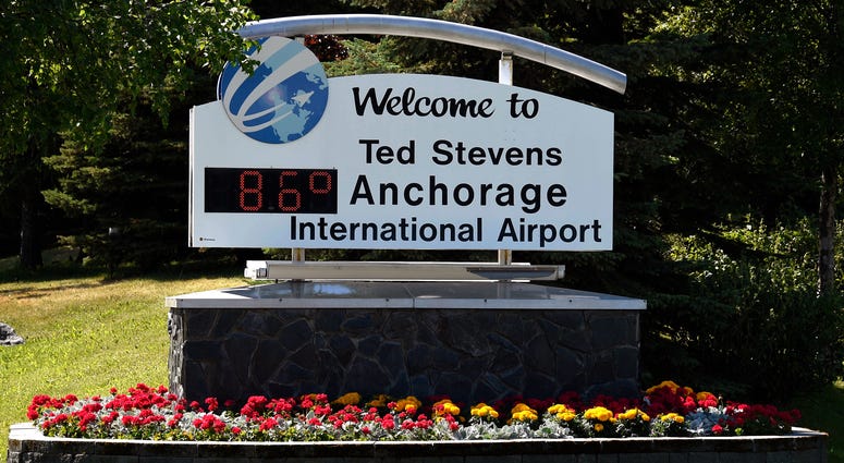 A welcome sign at Ted Stevens Anchorage International Airport indicates the temperature is 86 degrees Fahrenheit at 3:07 pm on July 4, 2019 in Anchorage, Alaska. Ted Stevens Anchorage International Airport