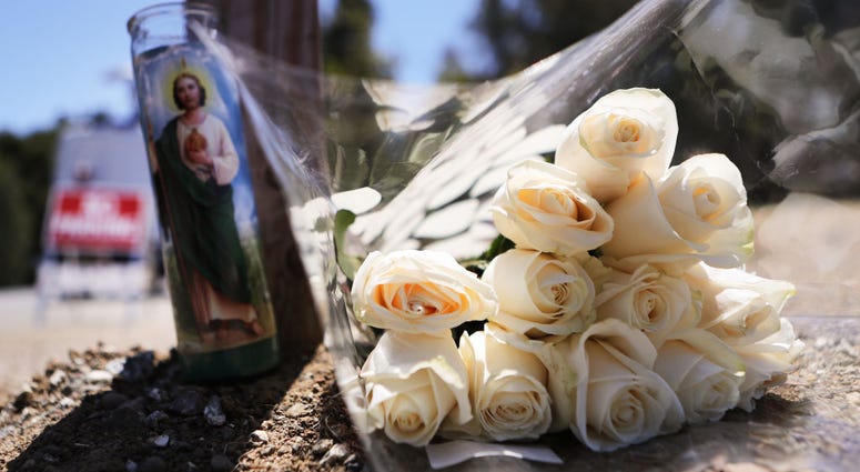 GILROY, CALIFORNIA - JULY 29: Flowers and a candle sit outside the site of the Gilroy Garlic Festival after a mass shooting there yesterday on July 29, 2019 in Gilroy, California. Three victims were killed and at least a dozen were wounded before police o GILROY, CALIFORNIA - JULY 29: Flowers and a candle sit outside the site of the Gilroy Garlic Festival after a mass shooting there yesterday on July 29, 2019 in Gilroy, California. Three victims were killed and at least a dozen were wounded before police o