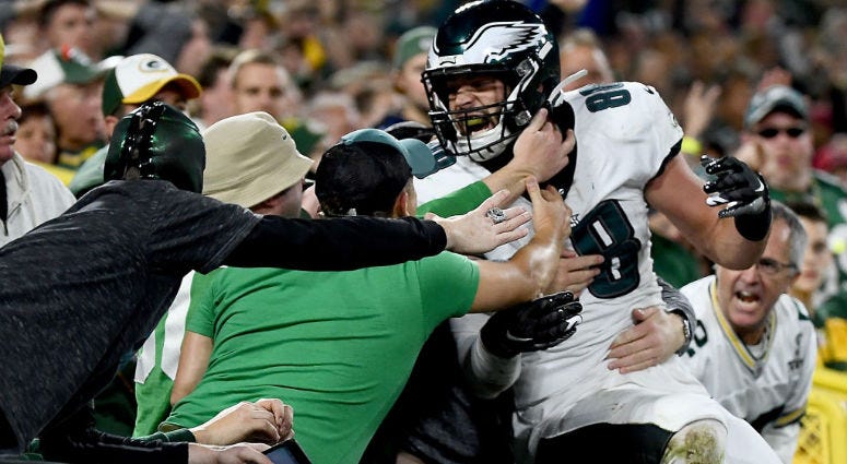 GREEN BAY, WISCONSIN - SEPTEMBER 26: Dallas Goedert #88 of the Philadelphia Eagles celebrates his touchdown with fans in the second quarter over the Green Bay Packers during the game at Lambeau Field on September 26, 2019 in Green Bay, Wisconsin. Dallas Goedert #88 of the Philadelphia Eagles celebrates his touchdown with fans in the second quarter over the Green Bay Packers during the game at Lambeau Field.