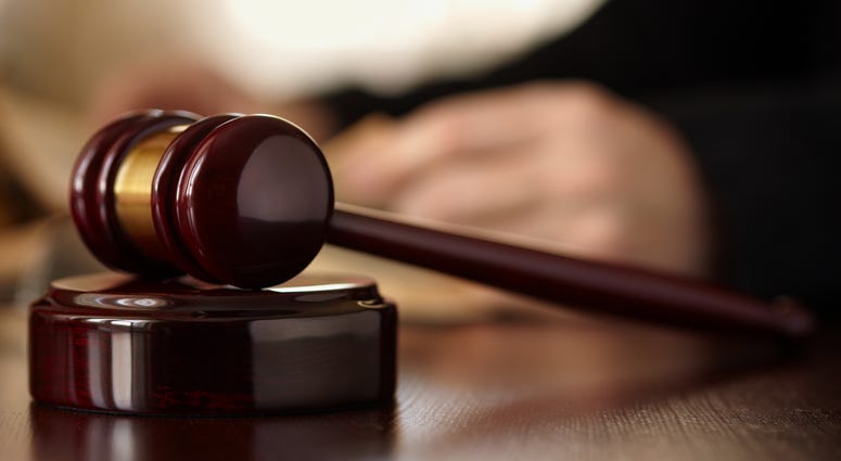 Gavel in a courtroom. Gavel in a courtroom.
