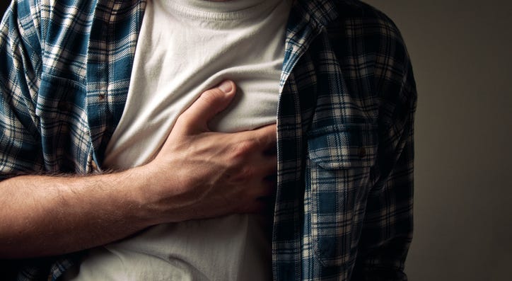 Man with chest pain. Man with chest pain.