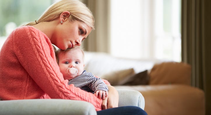 Mom suffering from postpartum depression. Mom suffering from postpartum depression.