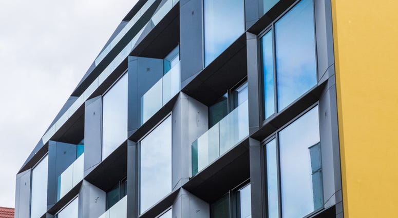 An apartment building. An apartment building.
