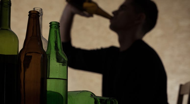 Teen male drinking alcohol. Teen male drinking alcohol.