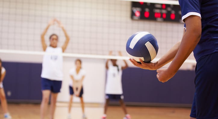 A volleyball game. A volleyball game.
