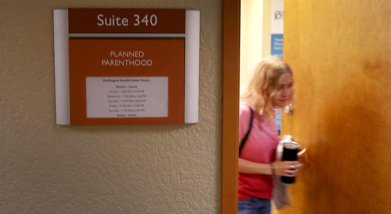 Madison Tolchin leaves after having a health checkup at a Planned Parenthood clinic on April 14, 2017 in Wellington, Florida. Madison Tolchin leaves after having a health checkup at a Planned Parenthood clinic on April 14, 2017 in Wellington, Florida.