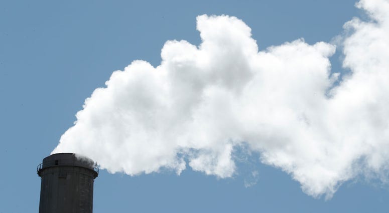 Emissions rise out of a large smoke stack at Pacificorp's 1000 megawatt coal fired power plant on October 9, 2017 outside Huntington, Utah. Emissions rise out of a large smoke stack at Pacificorp's 1000 megawatt coal fired power plant on October 9, 2017 outside Huntington, Utah.