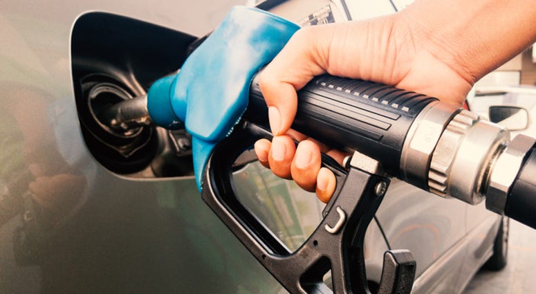 Pumping gas.