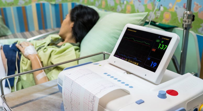 Printing of cardiogram report during a delivery. Delivery