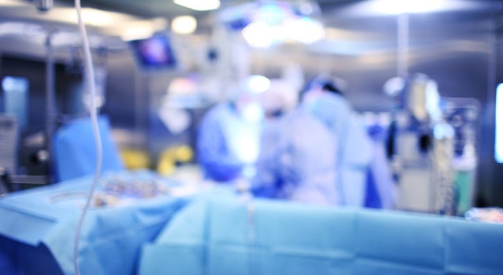 Doctors performing surgery. Doctors performing surgery.