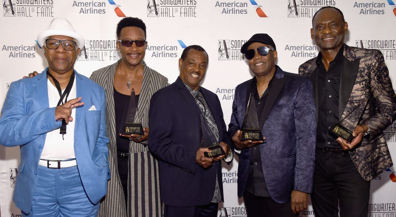NEW YORK, NY - JUNE 14: (L-R) Dennis Thomas, James "JT" Taylor, Robert "Kool" Bell, Ronald Bell, and George Brown of Kool & The Gang pose with their awards backstage during the Songwriters Hall of Fame 49th Annual Induction and Awards Dinner. Dennis Thomas, James "JT" Taylor, Robert "Kool" Bell, Ronald Bell, and George Brown of Kool & The Gang pose with their awards.