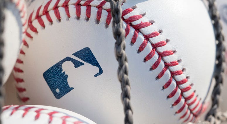PHILADELPHIA, PA - JUNE 28: A baseball with MLB logo is seen at Citizens Bank Park before a game between the Washington Nationals and Philadelphia Phillies. PHILADELPHIA, PA - JUNE 28: A baseball with MLB logo is seen at Citizens Bank Park before a game between the Washington Nationals and Philadelphia Phillies.