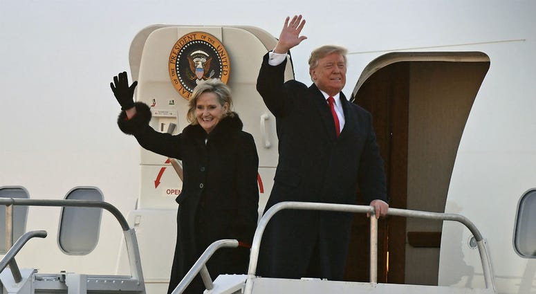 President Donald Trump and Sen. Cindy Hyde-Smith, R-Miss., wave to supporters after arriving for a rally in Tupelo, Miss., Monday, Nov. 26, 2018. President Donald Trump and Sen. Cindy Hyde-Smith, R-Miss., wave to supporters after arriving for a rally in Tupelo, Miss., Monday, Nov. 26, 2018.