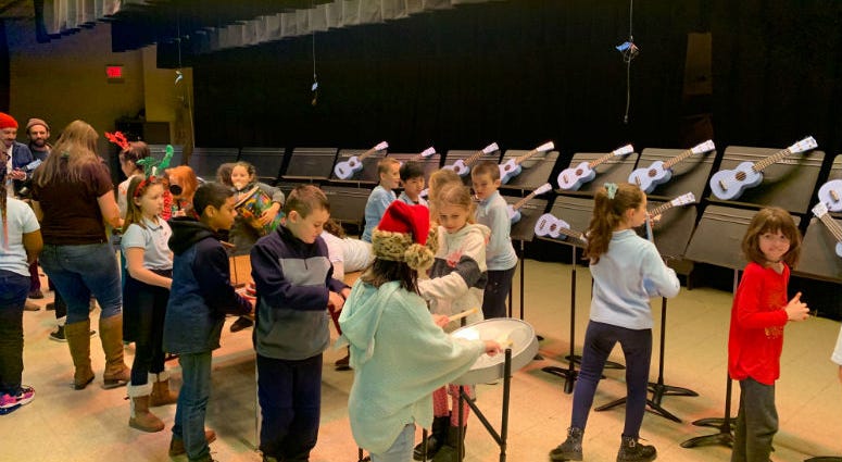 Students at Hackett Elementar get new instruments. Students at Hackett Elementar get new instruments.