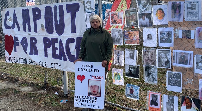 Operation Save Our City founder Rosalind Pichardo poses with a photograph or her brother, whose 2012 murder remains unsolved. Operation Save Our City founder Rosalind Pichardo poses with a photograph or her brother, whose 2012 murder remains unsolved.