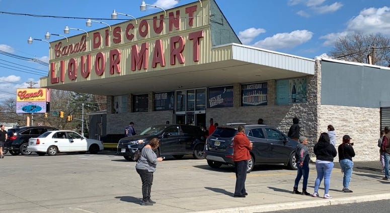People waiting in line to get into Canal's Discount Liquor Mart in South Jersey. Canal's Discount Liquor Mart in South Jersey.