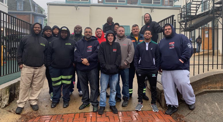 The Tows for Tots drivers, including Charles Norton, who organized the donation effort. The Tows for Tots drivers, including Charles Norton, who organized the donation effort.