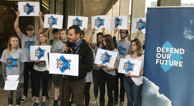 Colin Pepper with Defend Our Future advocates for clean car standards. Colin Pepper with Defend Our Future advocates for clean car standards.