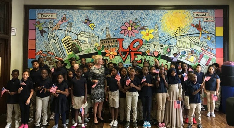 Judge Marjorie Rendell stepped from behind the bench to the front of the classroom to teach a special lesson on civic engagement to students at E. M. Stanton Elementary School in South Philadelphia. Judge Marjorie Rendell with students at E. M. Stanton Elementary School