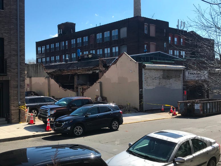 Officials say the wind is to blame for a partial building collapse at Fifth and Master streets in Kensington. Officials say the wind is to blame for a partial building collapse at Fifth and Master streets in Kensington.