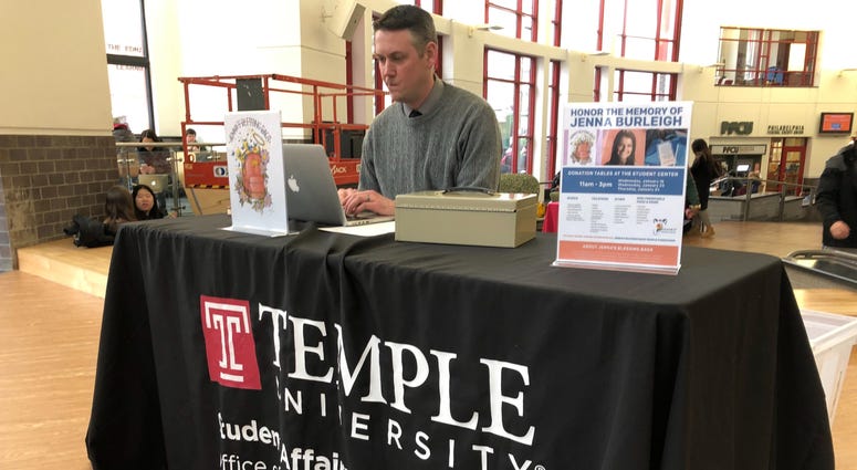 Chris Carey, Senior Associate in the Dean of Students Office, mans the donation booth in Jenna Burleigh's memory, which collects toiletries for the homeless. Chris Carey, Senior Associate in the Dean of Students Office, mans the donation booth in Jenna Burleigh's memory, which collects toiletries for the homeless.