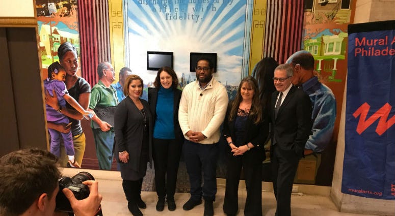 James "Yaya" Hough is the Philadelphia District Attorney's Office's first-ever artist-in-residence. James "Yaya" Hough with DA Larry Krasner.