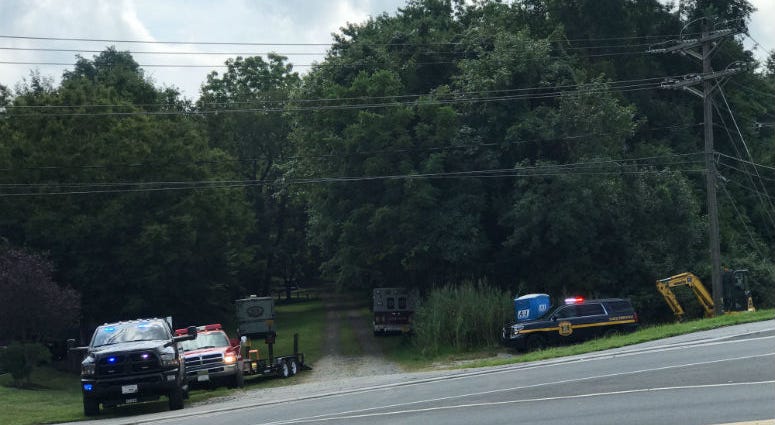 Officials say a small plane crashed into the woods in Delaware.